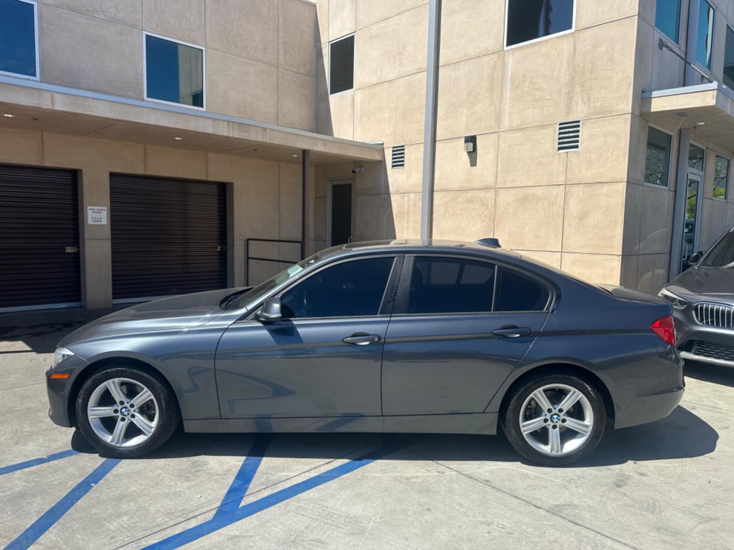 2014 Gray /Black BMW 3-Series leather (WBA3B1C52EK) with an 4 Cylinder engine, Automatic transmission, located at 30 S. Berkeley Avenue, Pasadena, CA, 91107, (626) 248-7567, 34.145447, -118.109398 - Photo#2